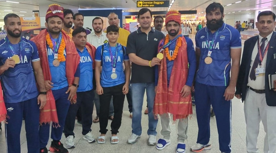 एशियन गेम्स के खिलाड़ियों का स्वागत